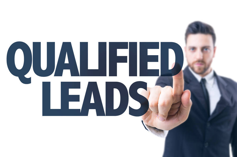business-man-pointing-text-qualified-leads-exclusive-shared-difference