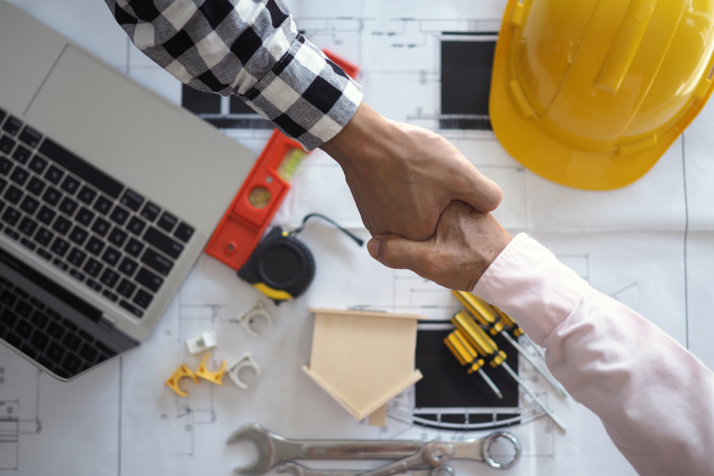 hand-between-project-contractors-customers-home-improvement-leads-homeguru-thumbnail